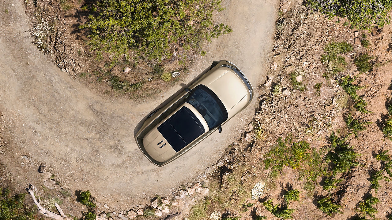 Ranger Rover Driving on Hill Road