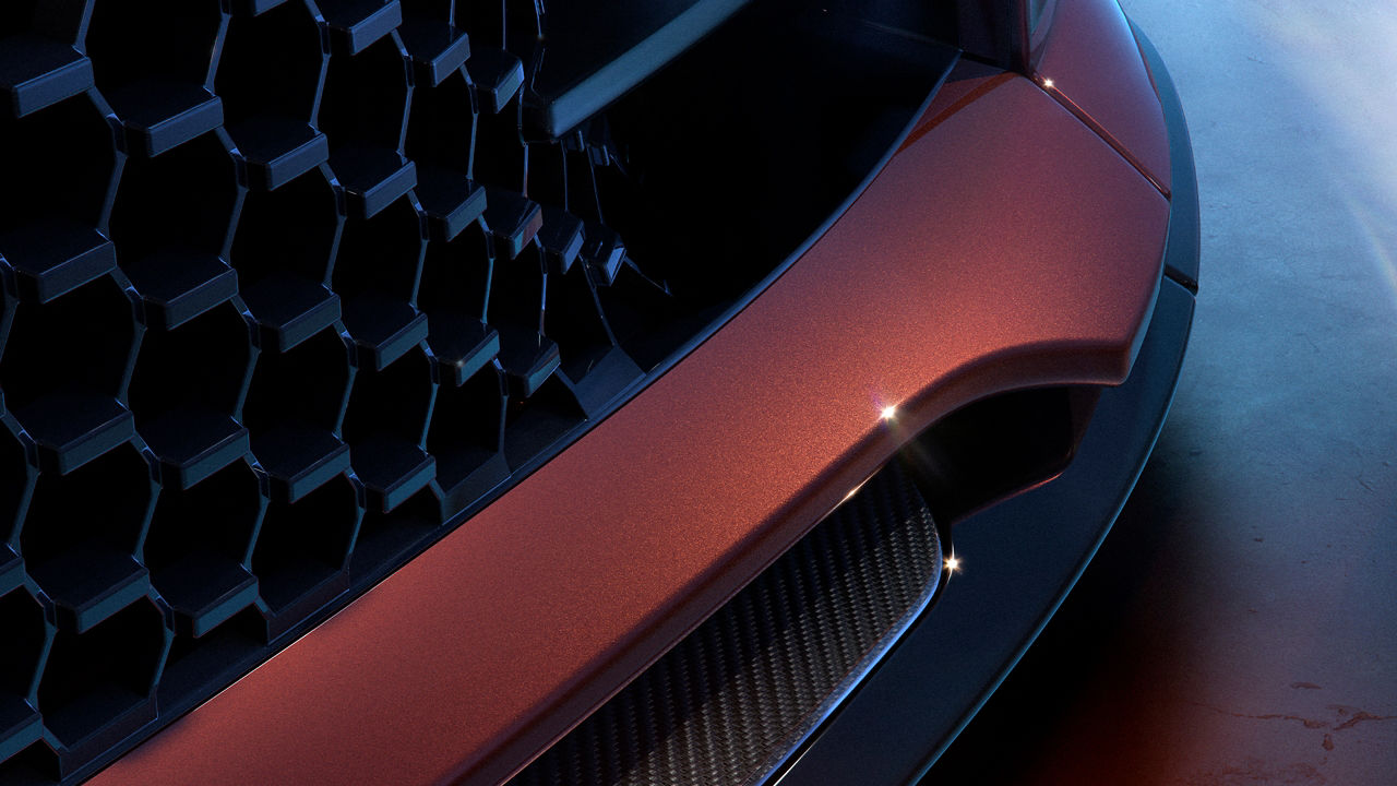 Close up of Range Rover Sport SV Carbon front grille in black.