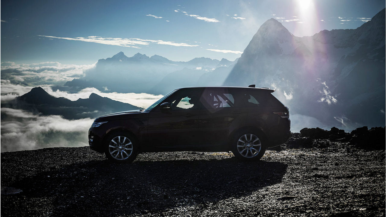 Land rover is parked in mountain landscape