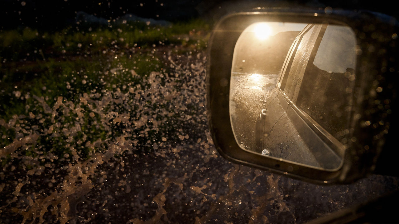 Splashing Water on Side View Mirror