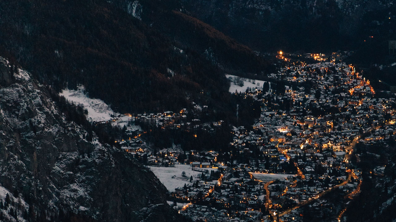 Snowy night light view from the mountain