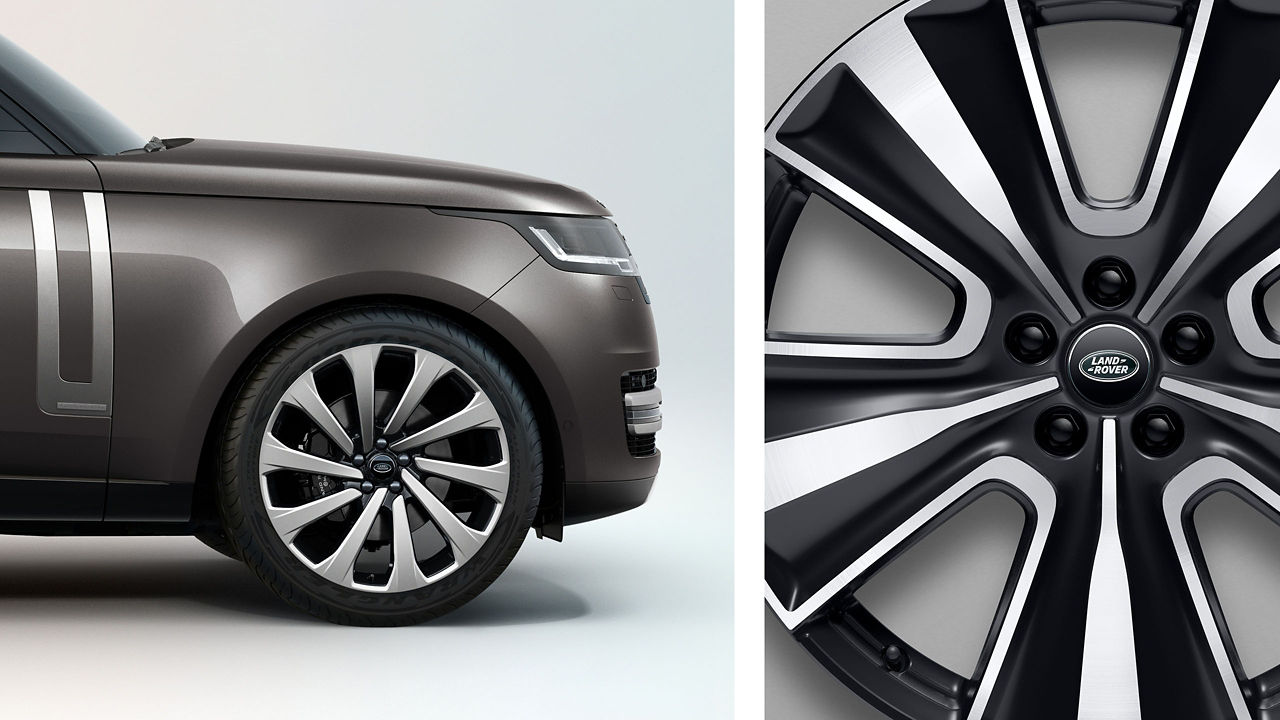 Close up of 5 spoke design Range Rover alloy wheels with titanium look finish