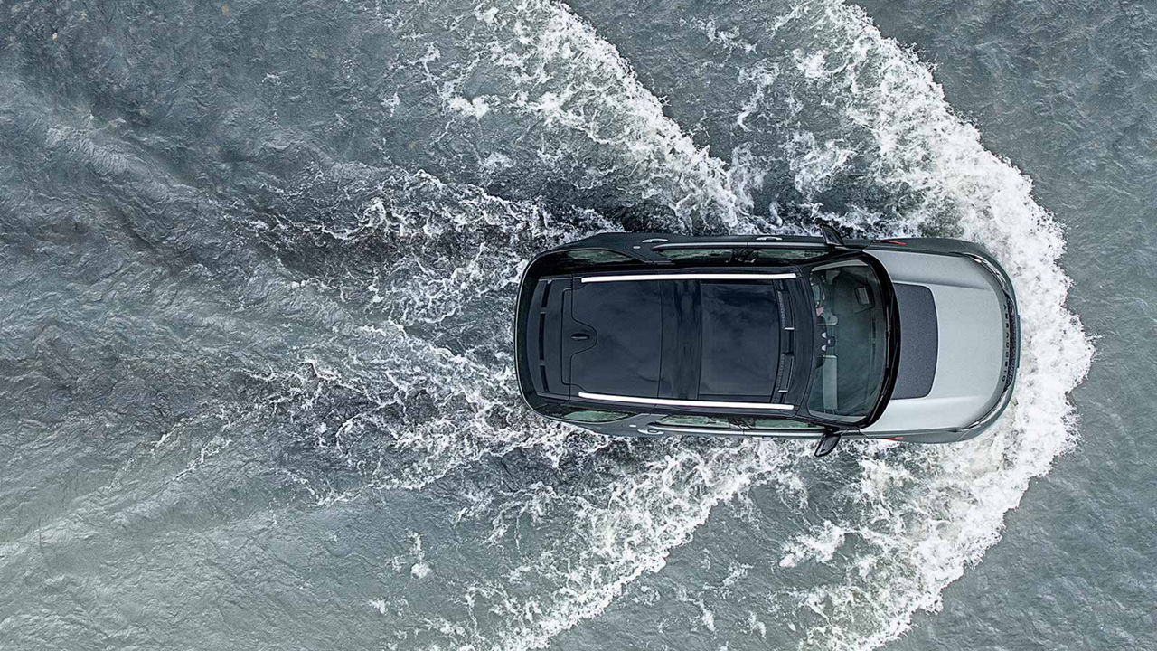 Car driving through water