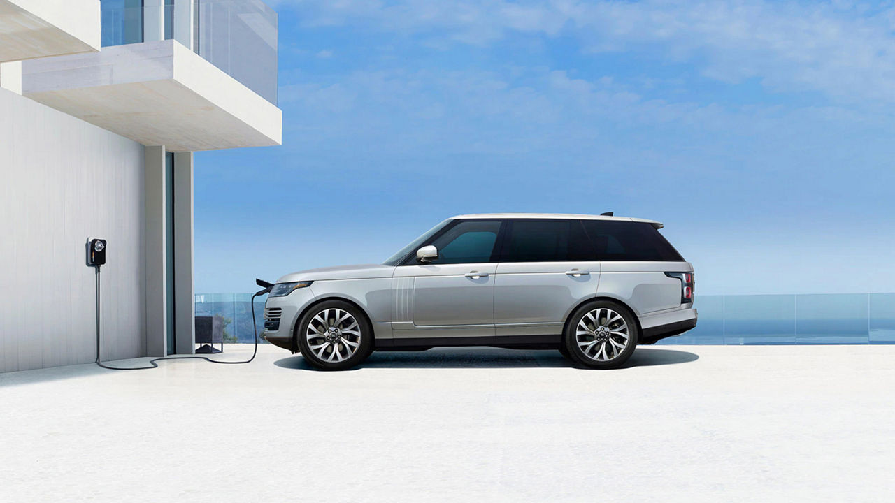 Land Rover Phev Vehicle charging from the port into the front grille