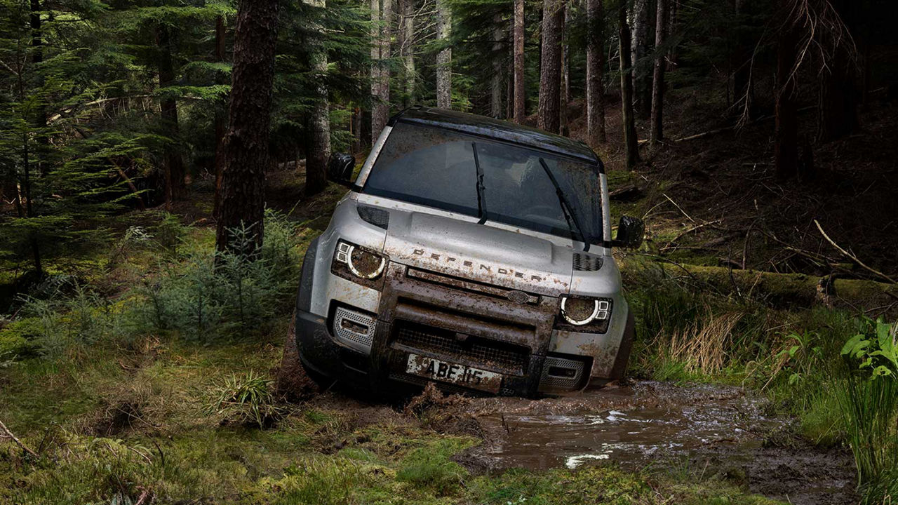 Land Rover Defender off-road in the country