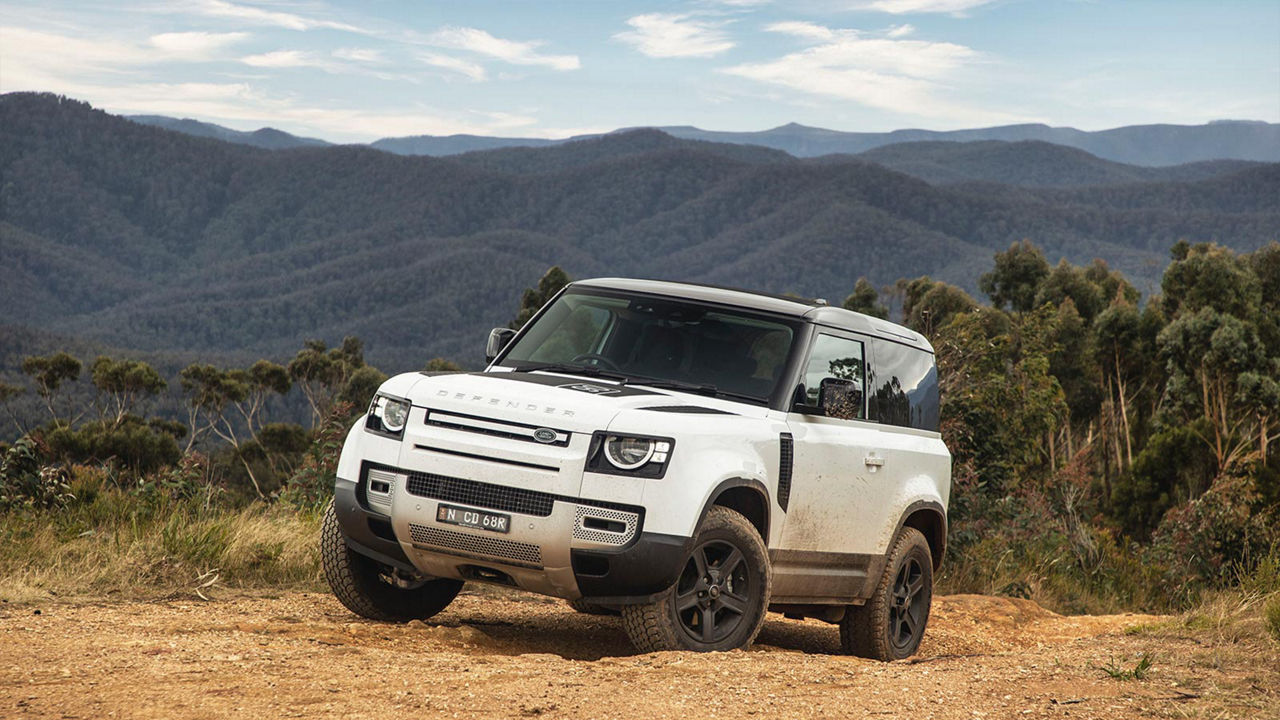 Defender driving off-road