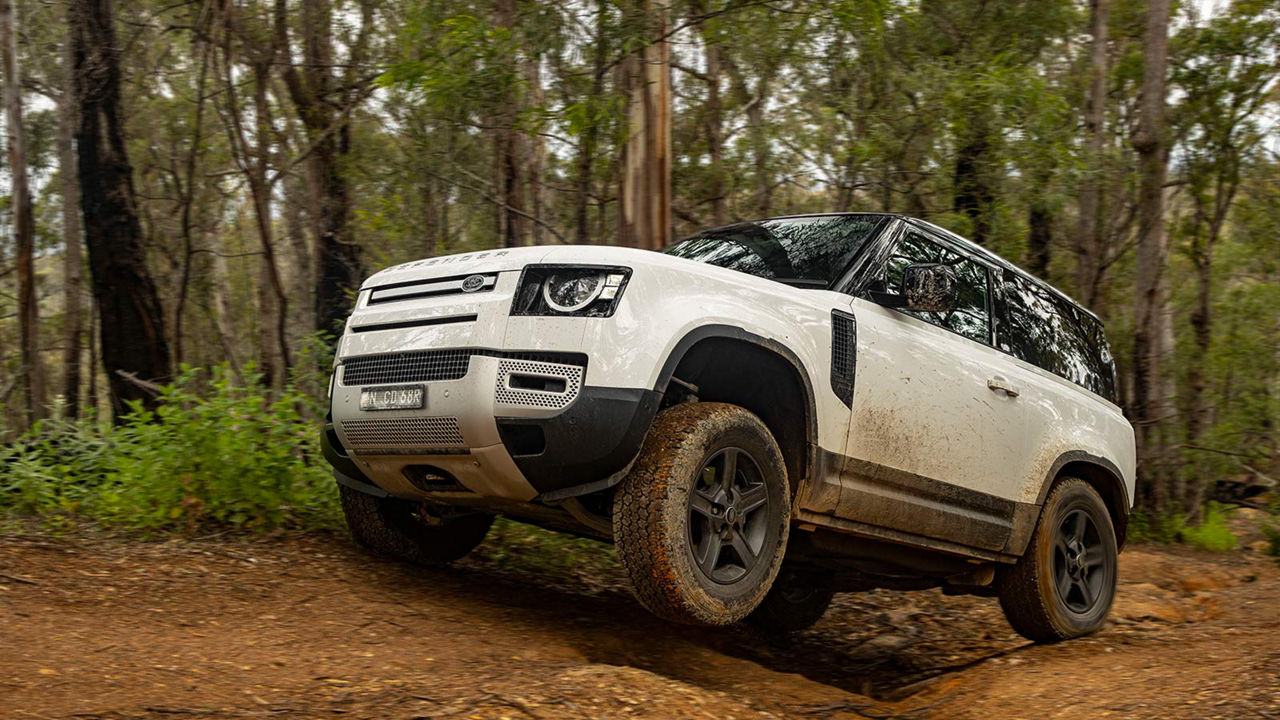 Defender driving off-road