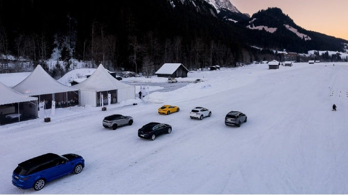 Multiple Land Rover Driving on Snow and Ice