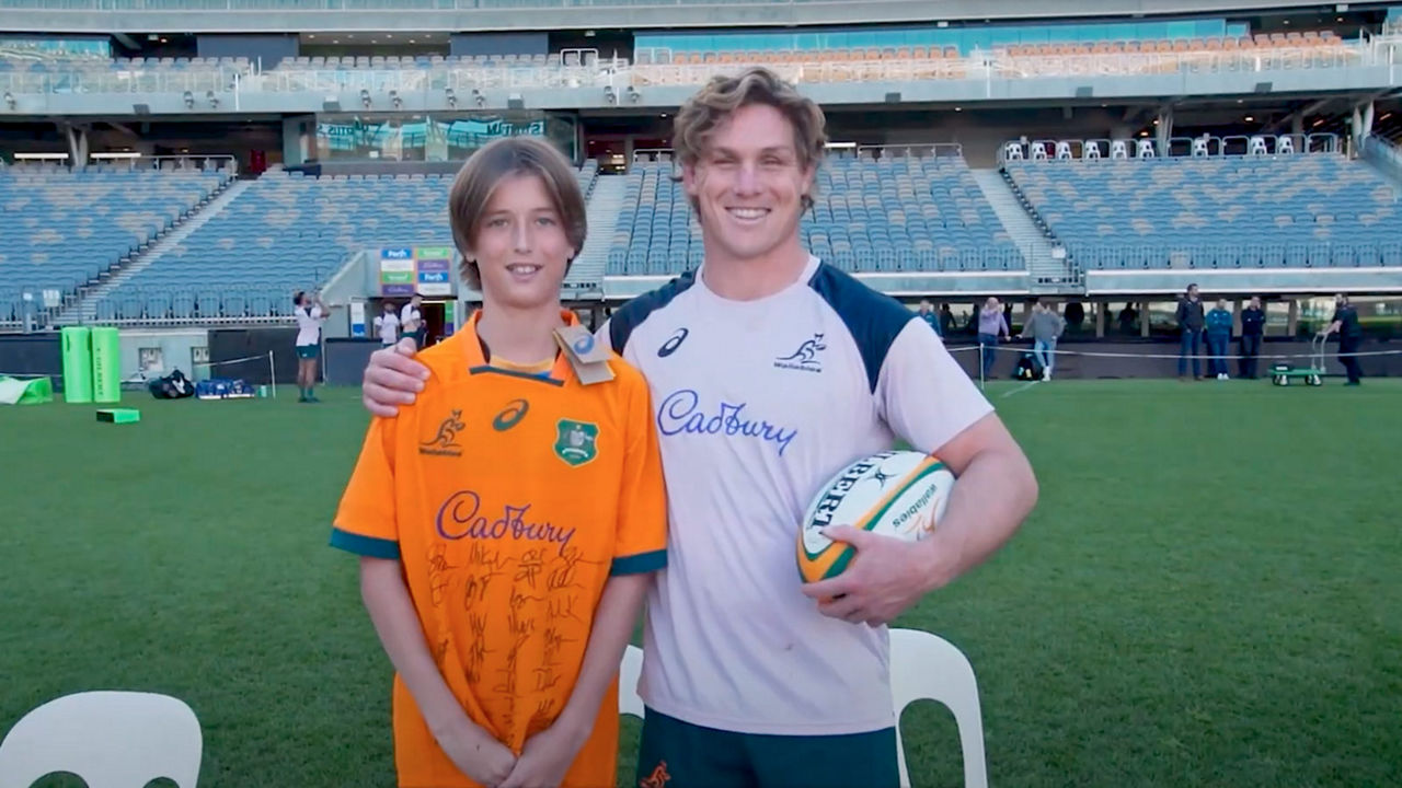 Rugby player and boy