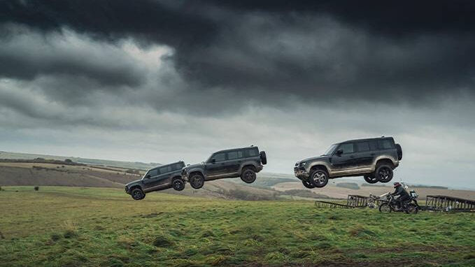 Range Rover vehicles jumping mid-air