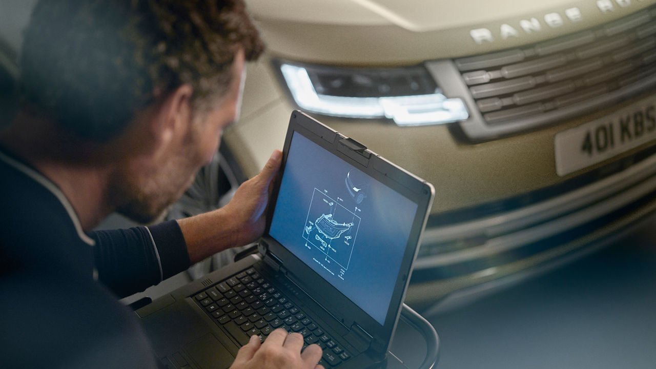 Man looking to laptop