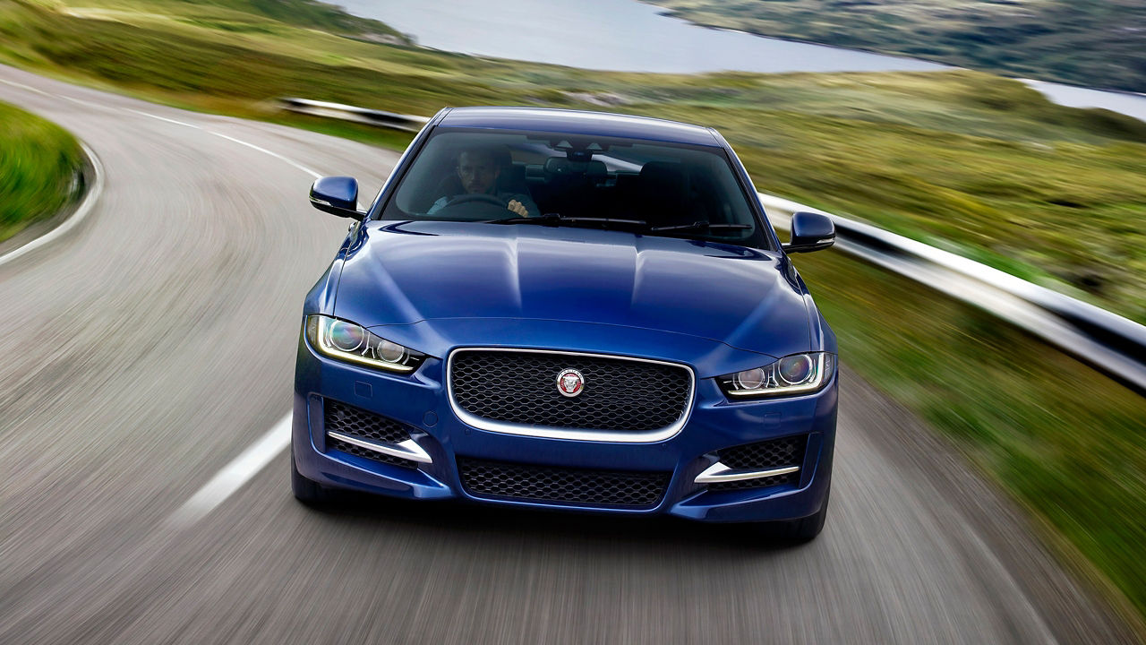 JAGUAR XE Moving on a Hilly Terrain Road