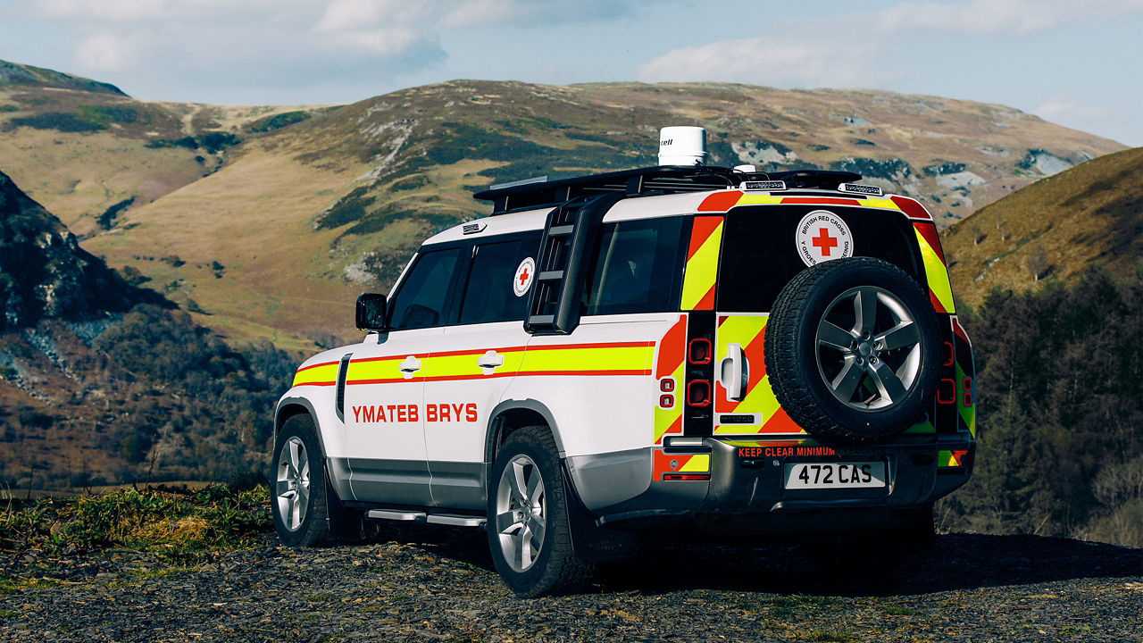 Custom-made Defender 130 donated to the British Red Cross in commemoration of the Queen’s Platinum Jubilee sat on the hills