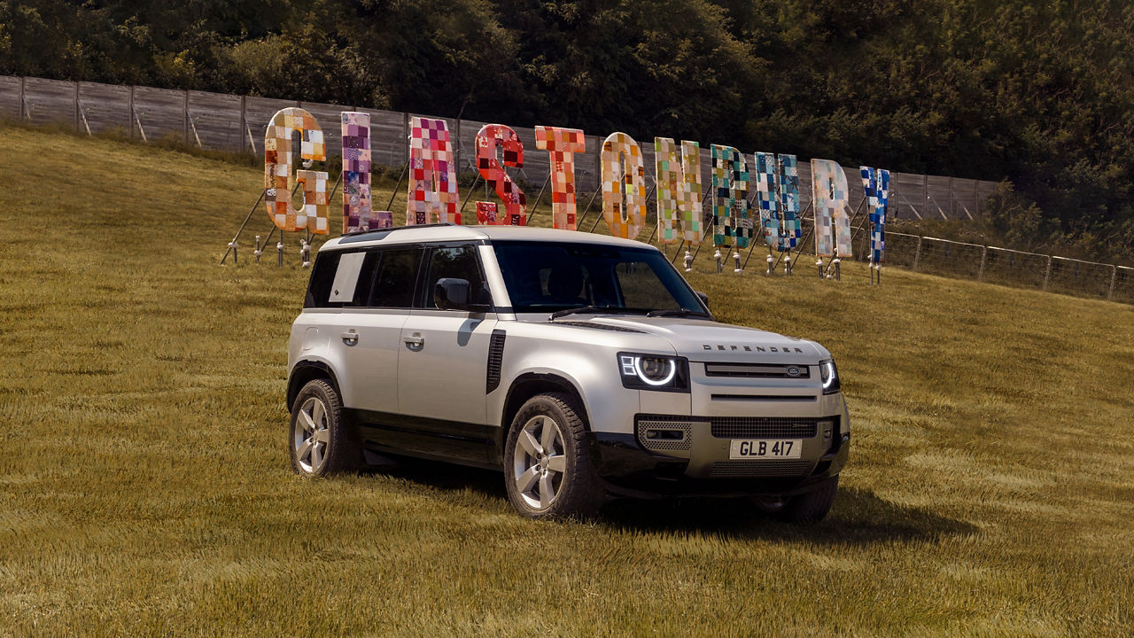 Defender parked on the grass