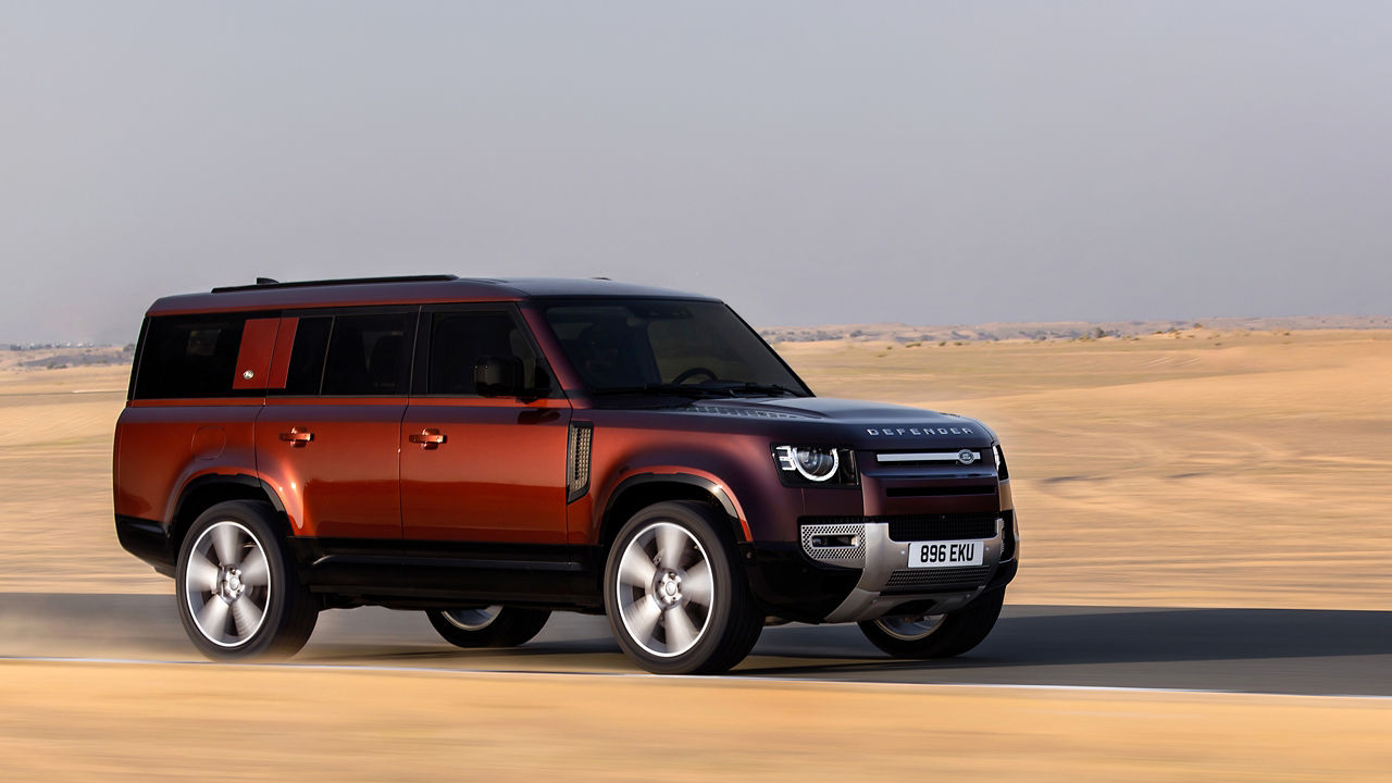 Defender running on the desert road