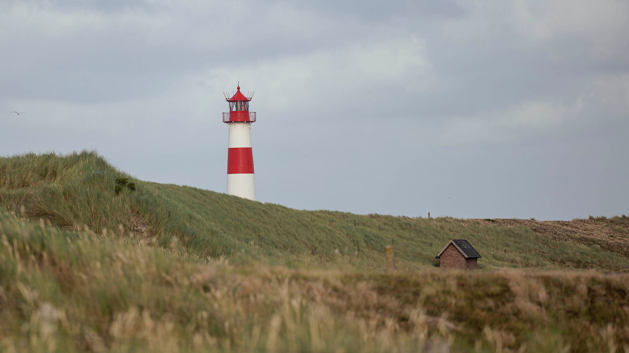A lighthouse in the middle of a valley