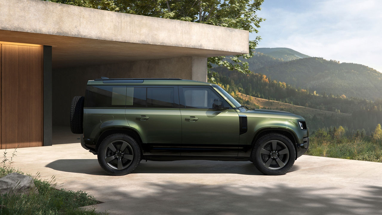 side view of a defender on the outside of a house