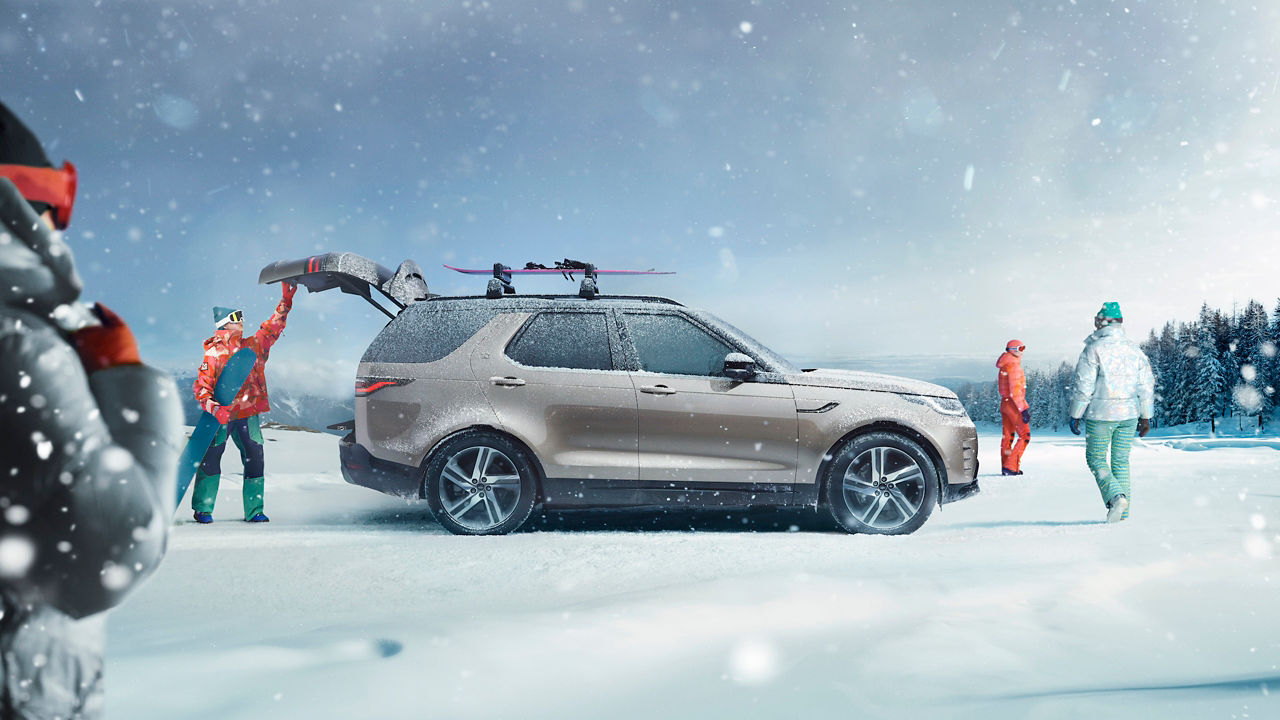 Discovery in a snowy forest with snow-boarders.