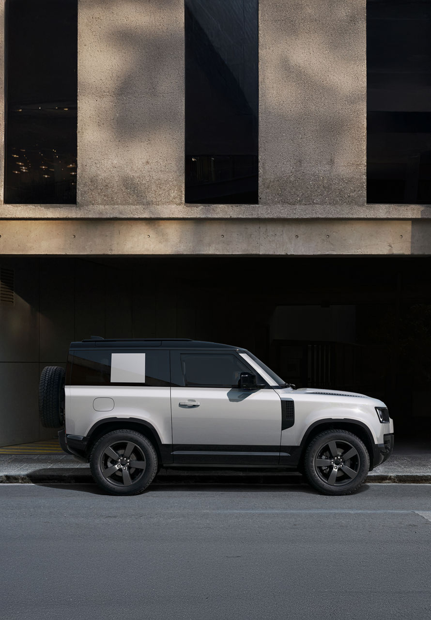 Side view of Defender parked