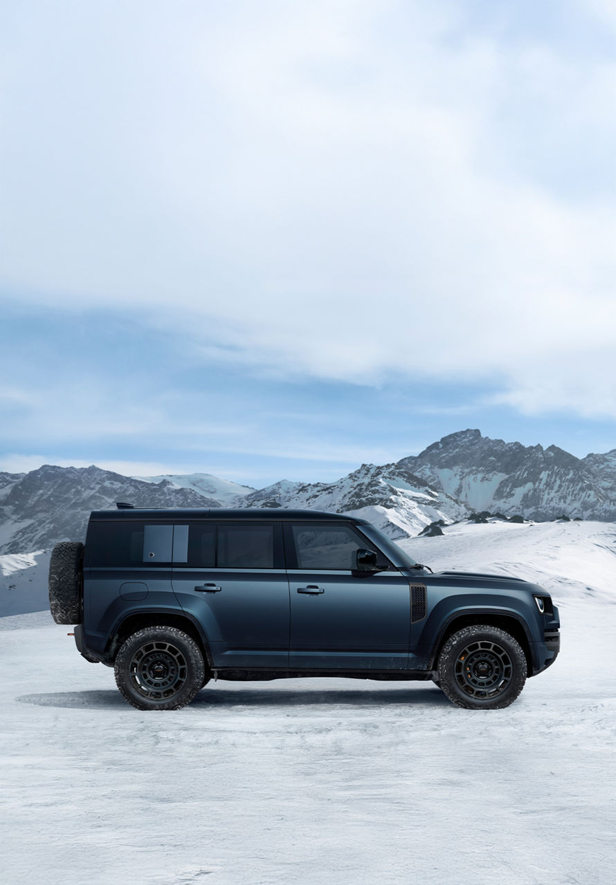 Side view of Defender parked