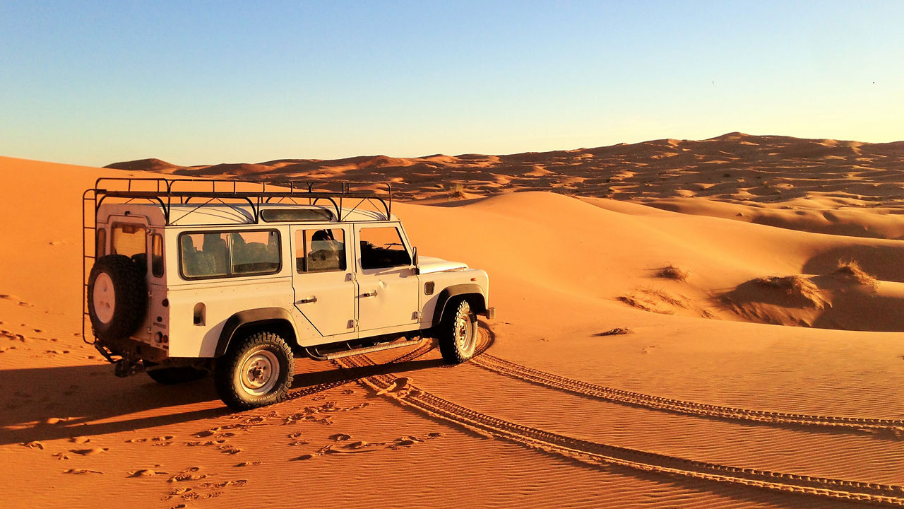 Defender parked in desert