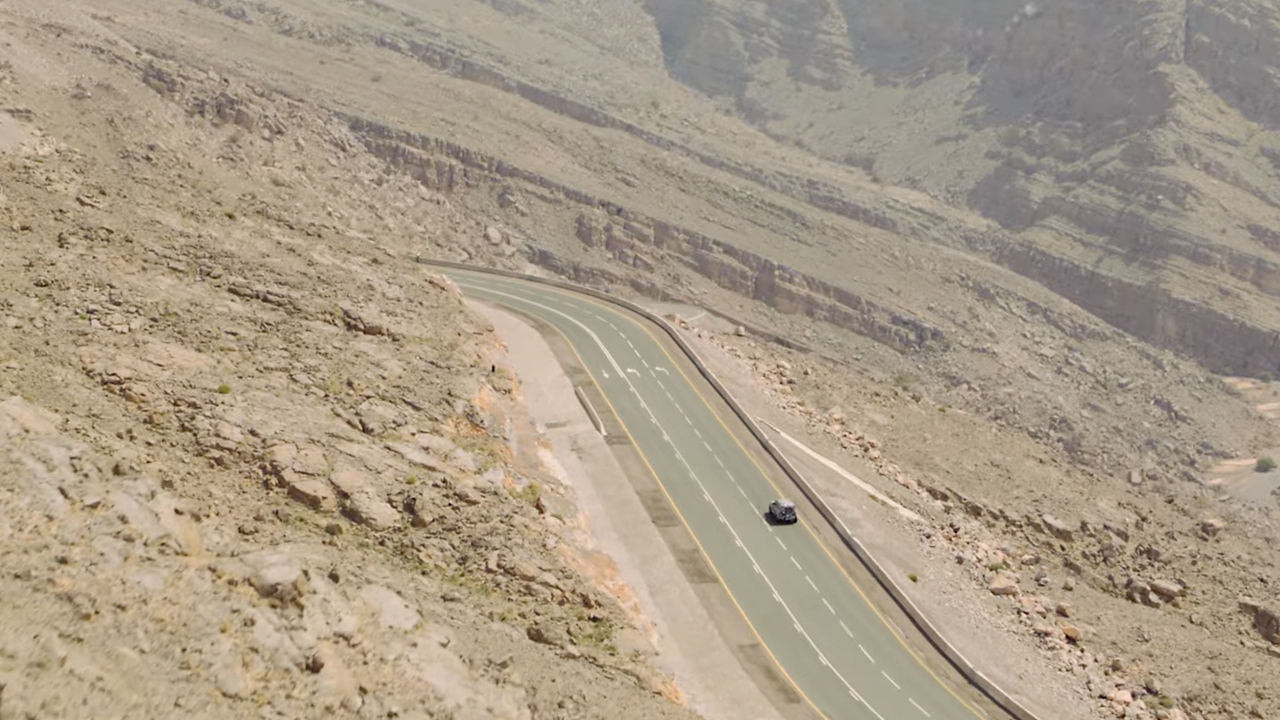 Defender on the hairpins of the Jebel Jais highway