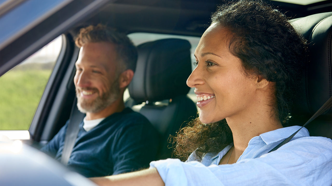 Man sitting in a car on driver's seat