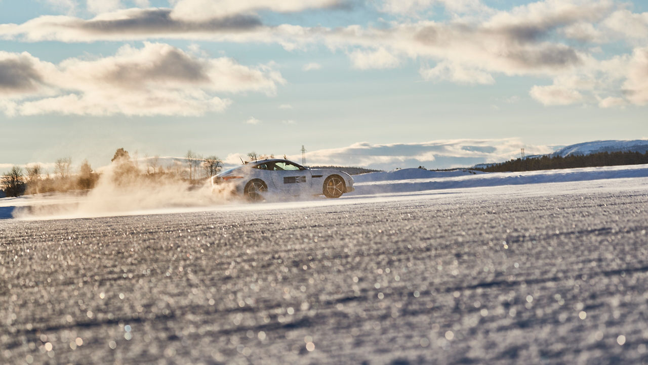 Driving a race car on a snowy road