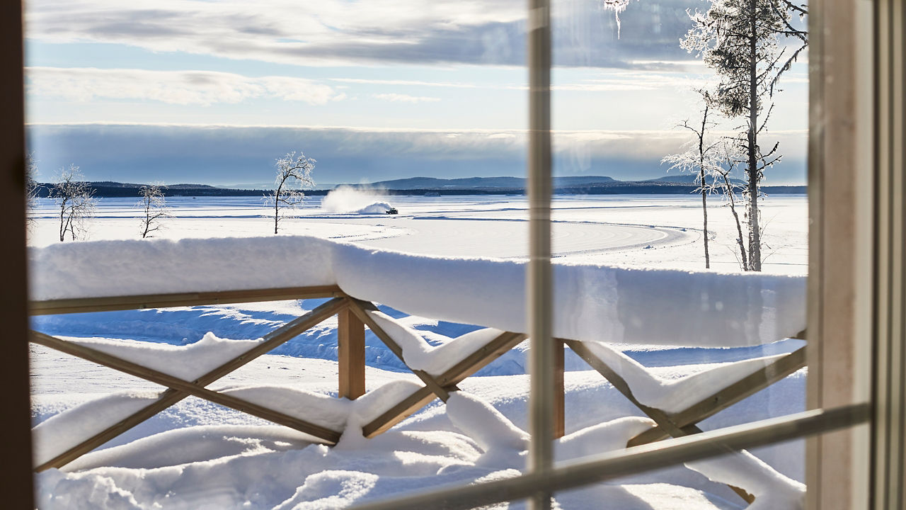 Balcony covered with snow and winter landscape outside beautiful snowy 