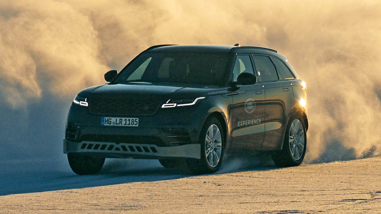 Velar racing on dusty race tracker 