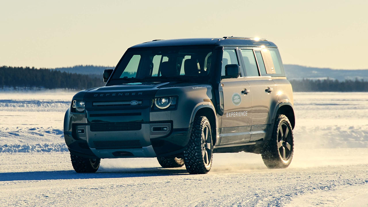 Defender running on icy road 