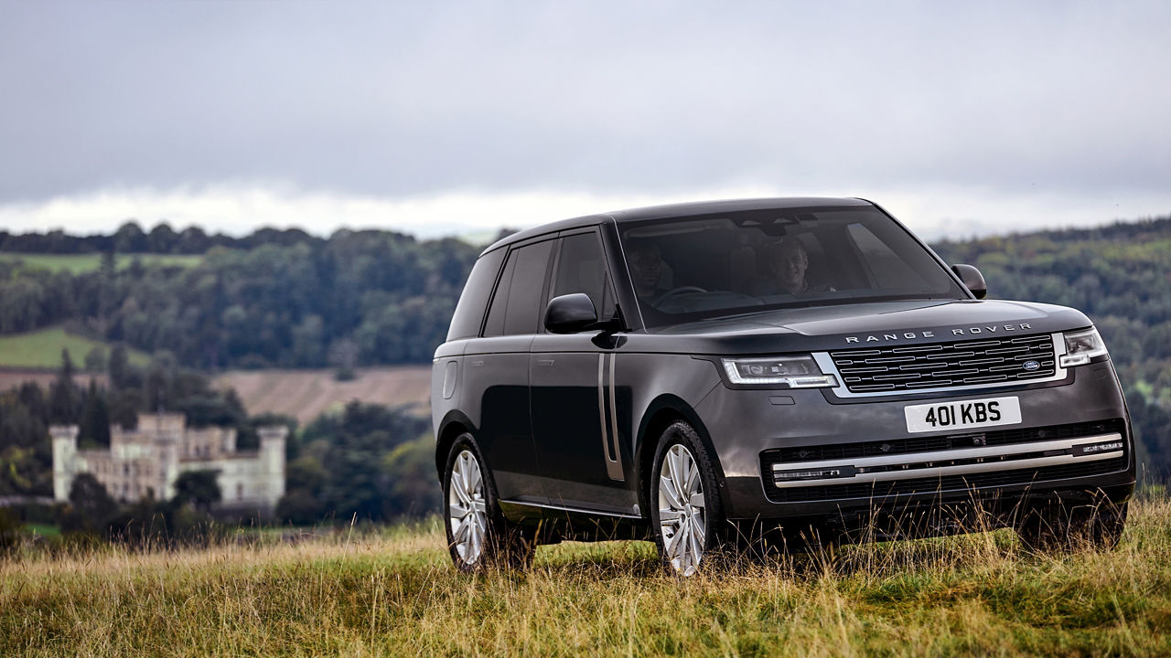 Range Rover parked on grass