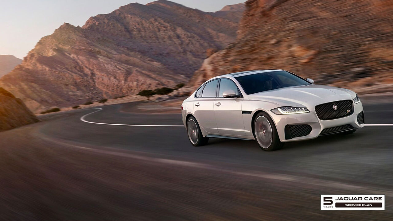 Jaguar XF mountain road 