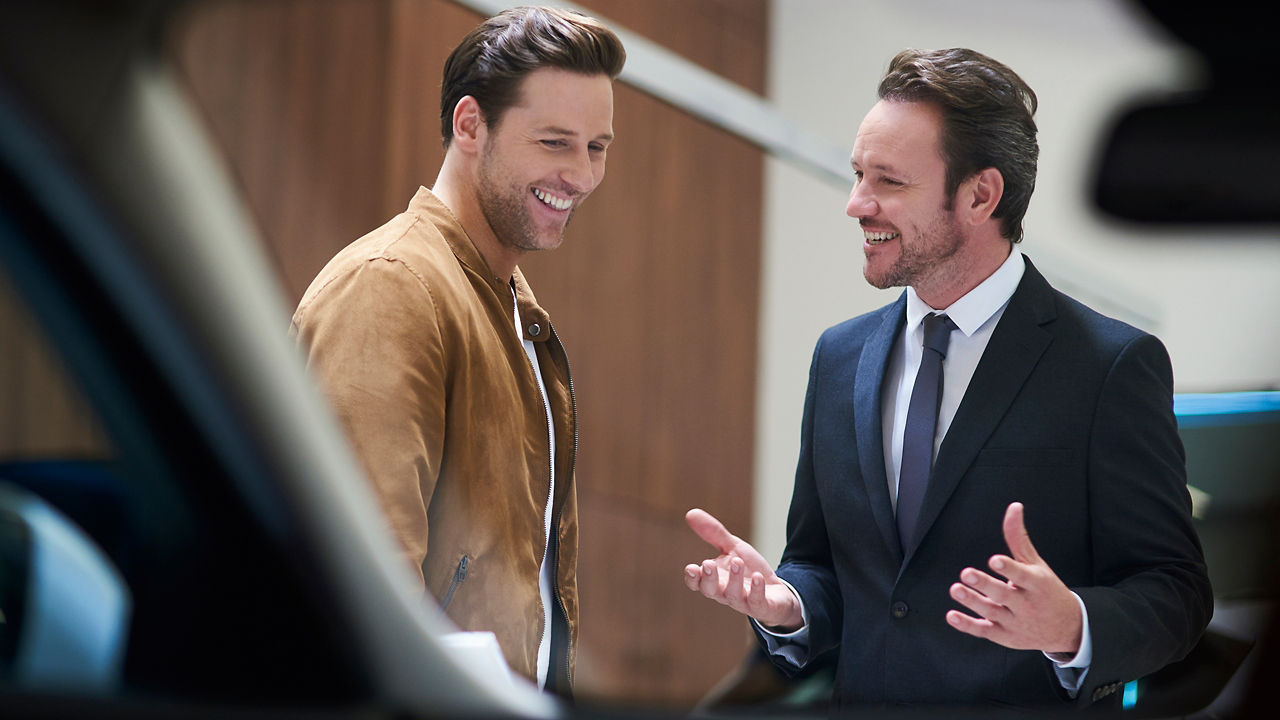 Two Business Man in Jaguar Showroom