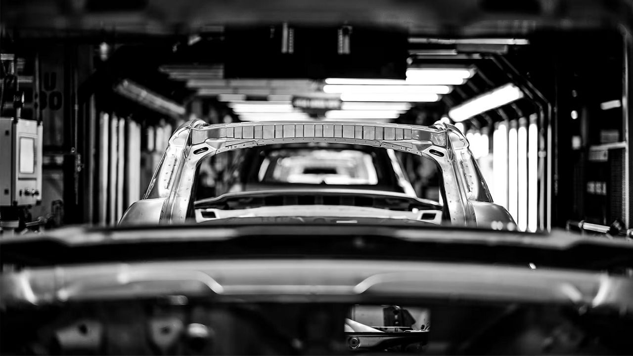 Plant tour in Halewood, view of Range Rover Evoque in BiW