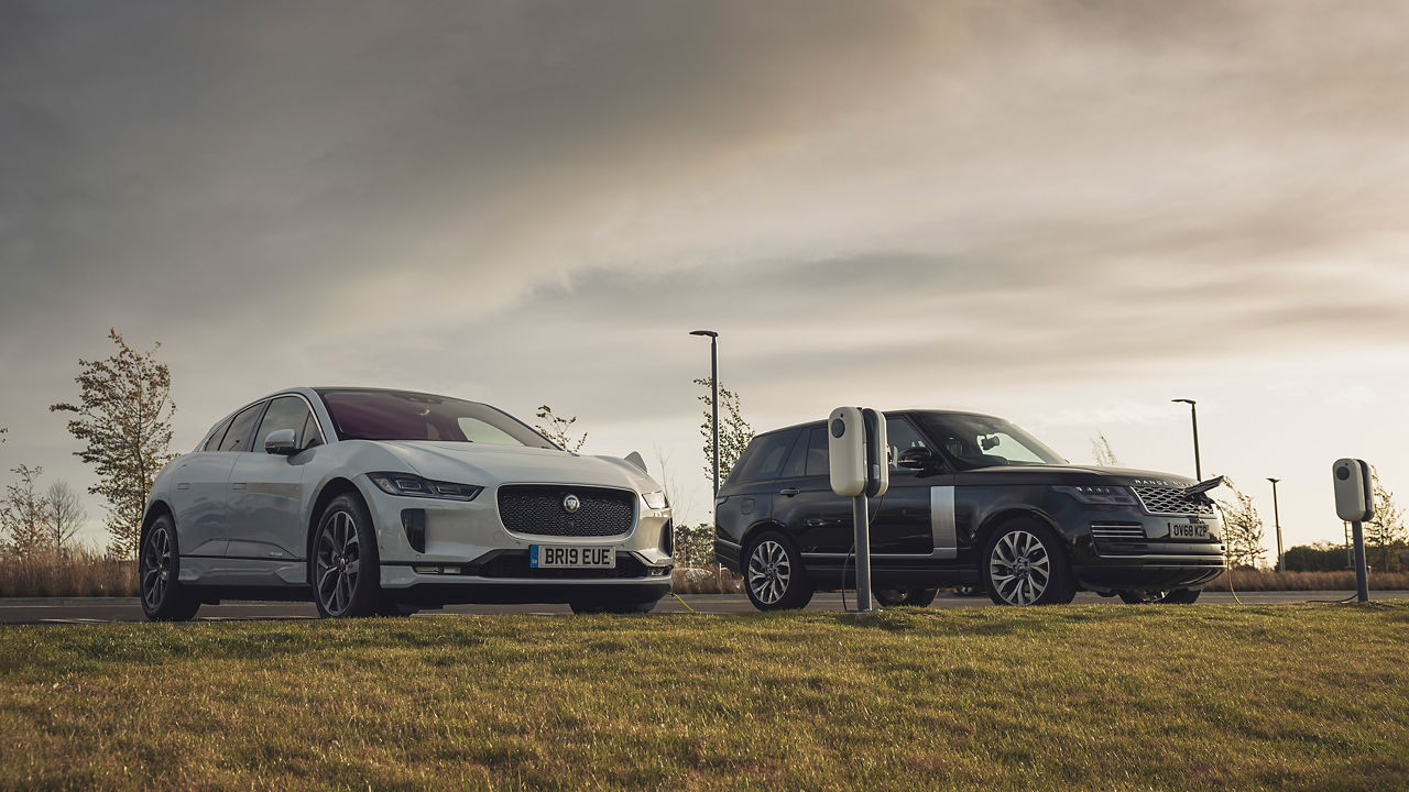 I-Pace and Range Rover Parked at Charging Station