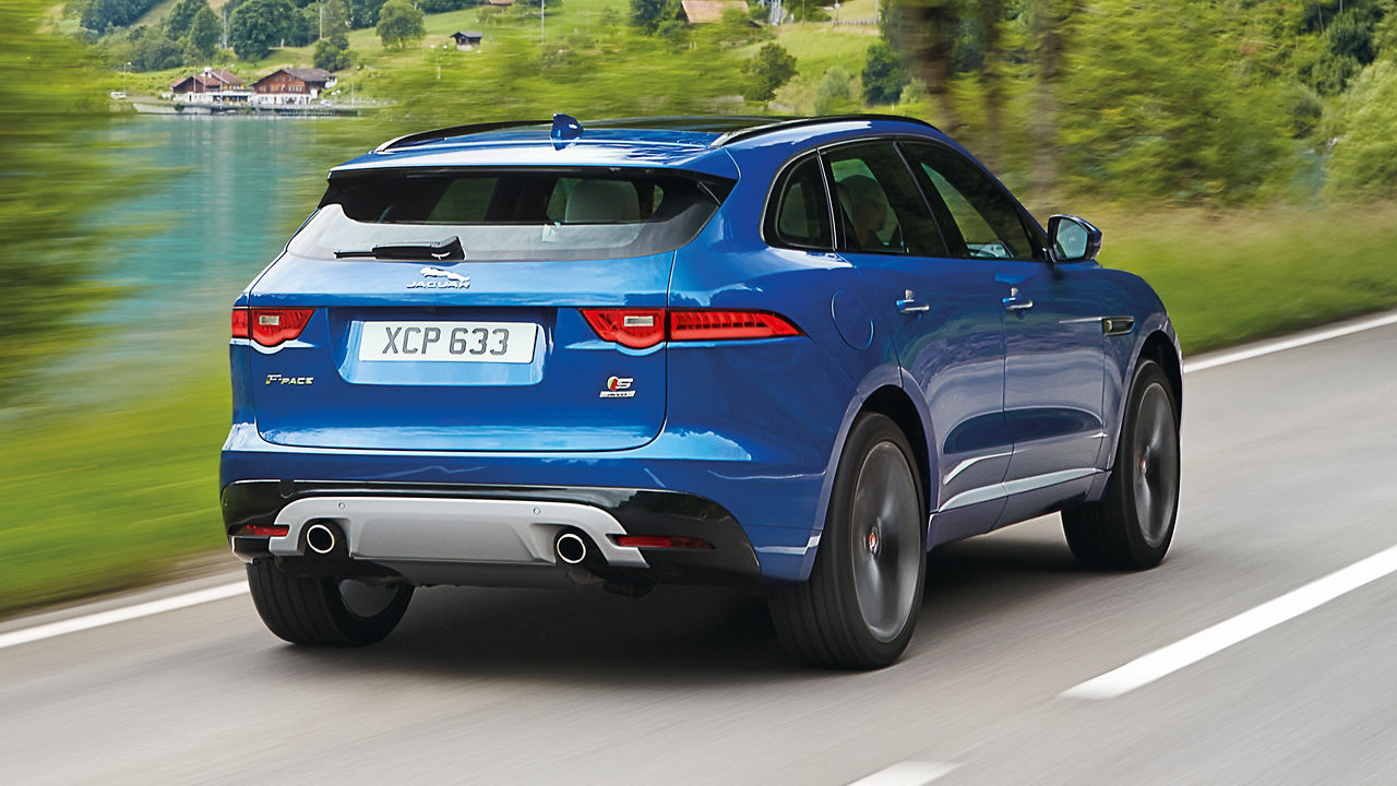 Jaguar  F-Pace running on a Hilly Road