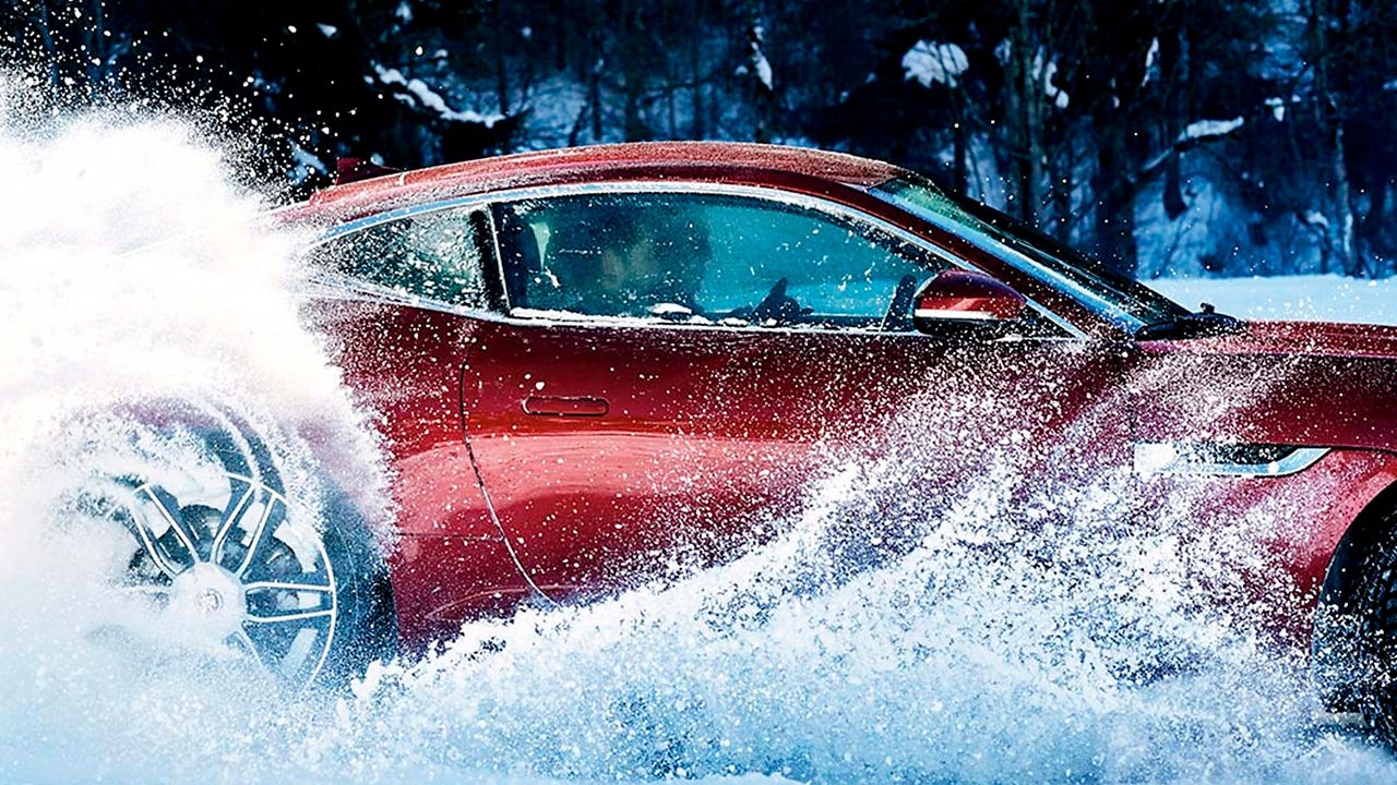 Jaguar F-Type drifting on ice