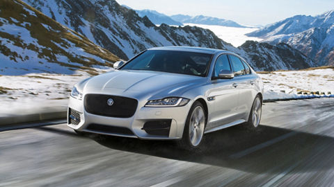 Jaguar XF running on mountain Ice road 