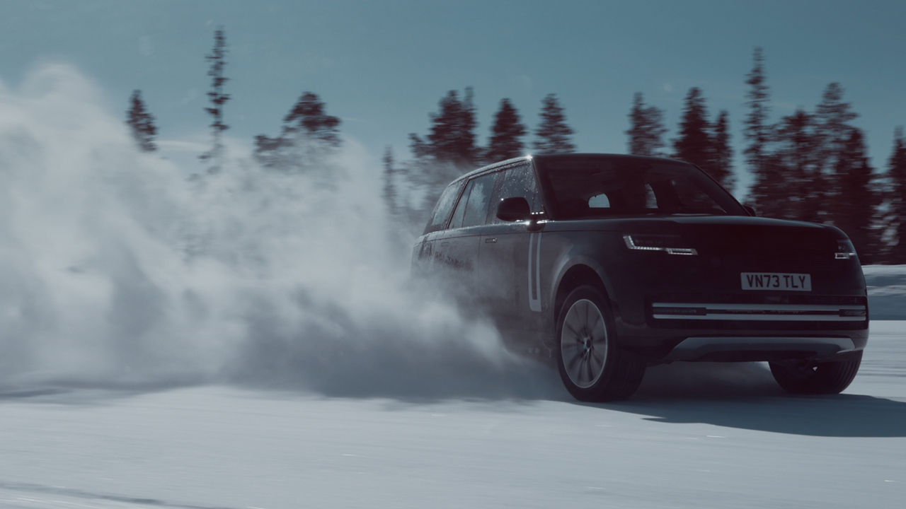 Range Rover driving in snow land