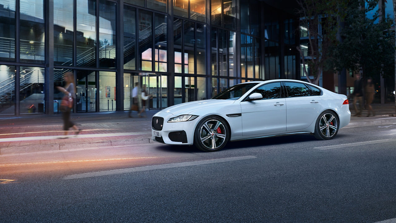 Jaguar XF parked on city road