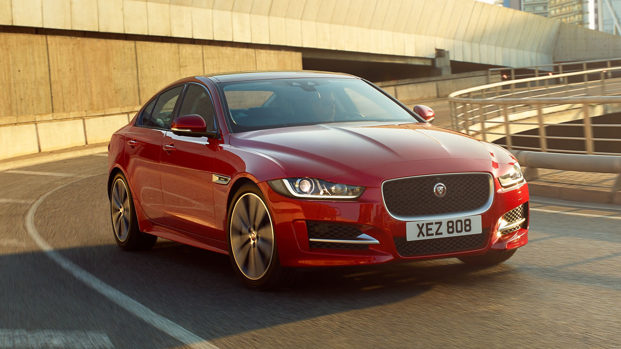 Jaguar XE running on Road