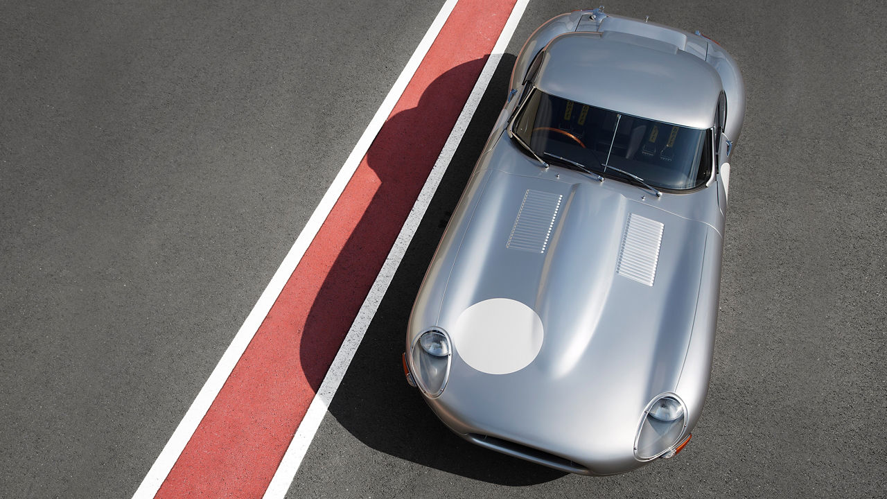 Jaguar E-Type car top view on racing track