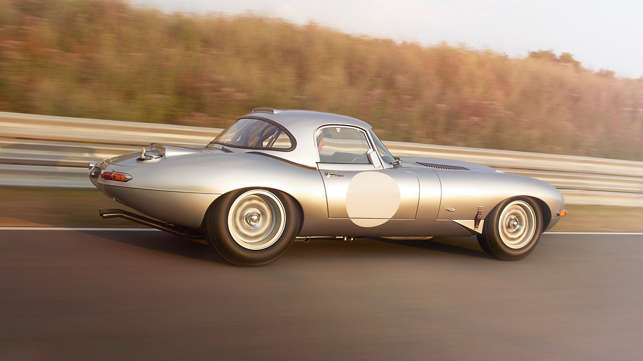 Jaguar E-Type car running on the road