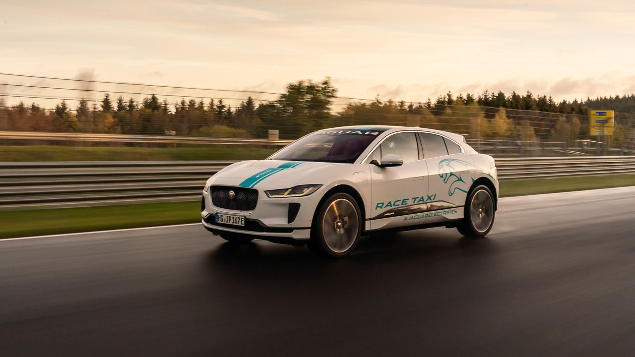 Jaguar I-PACE Taxi Running on Hilly Road
