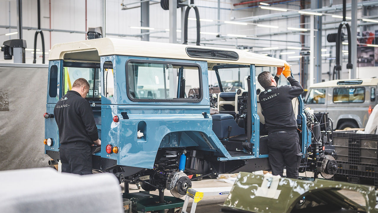 classic Defender Technician's working at factory