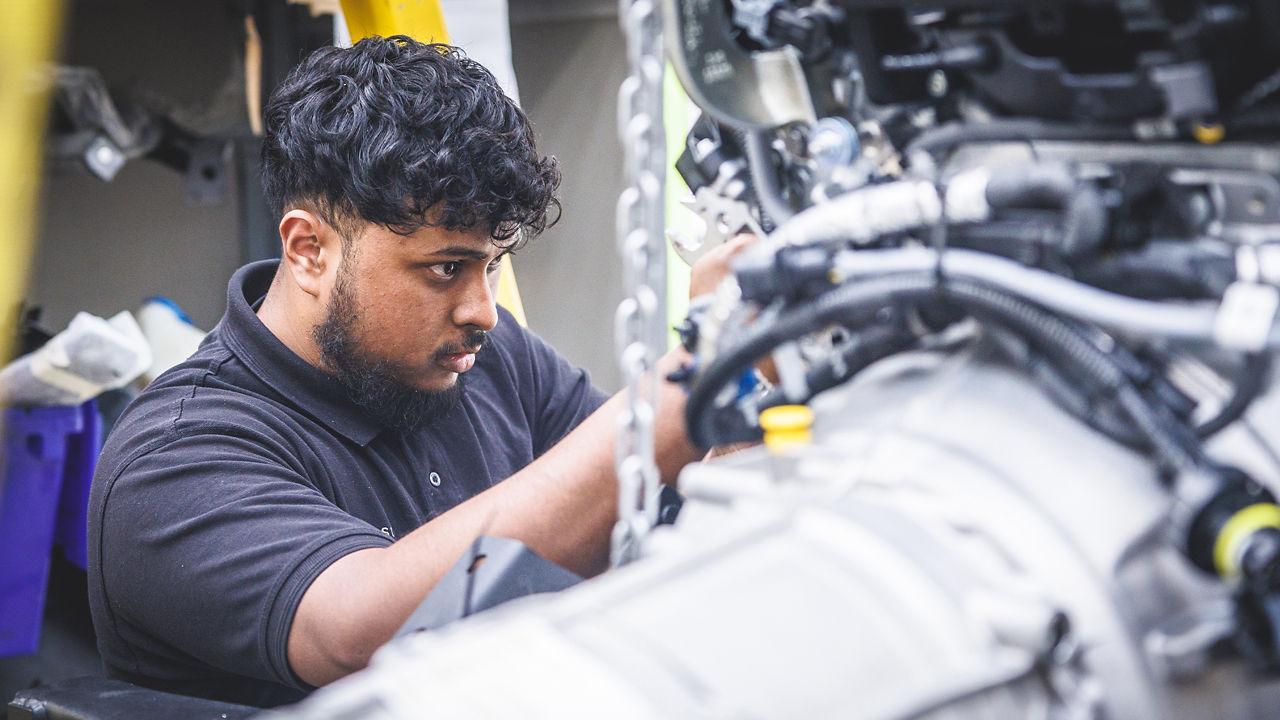 classic Defender Technician working at Engine