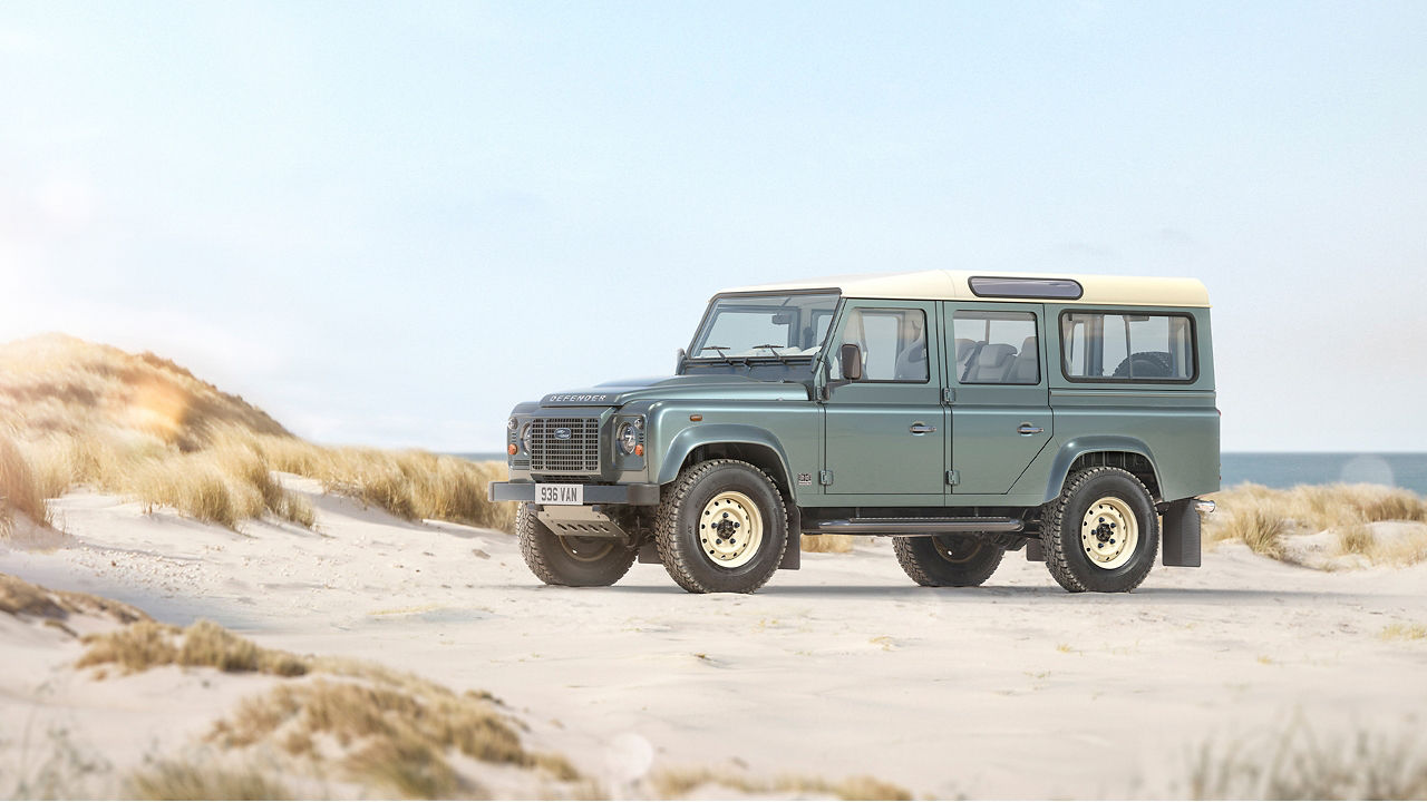 Classic Defender parked at seashore