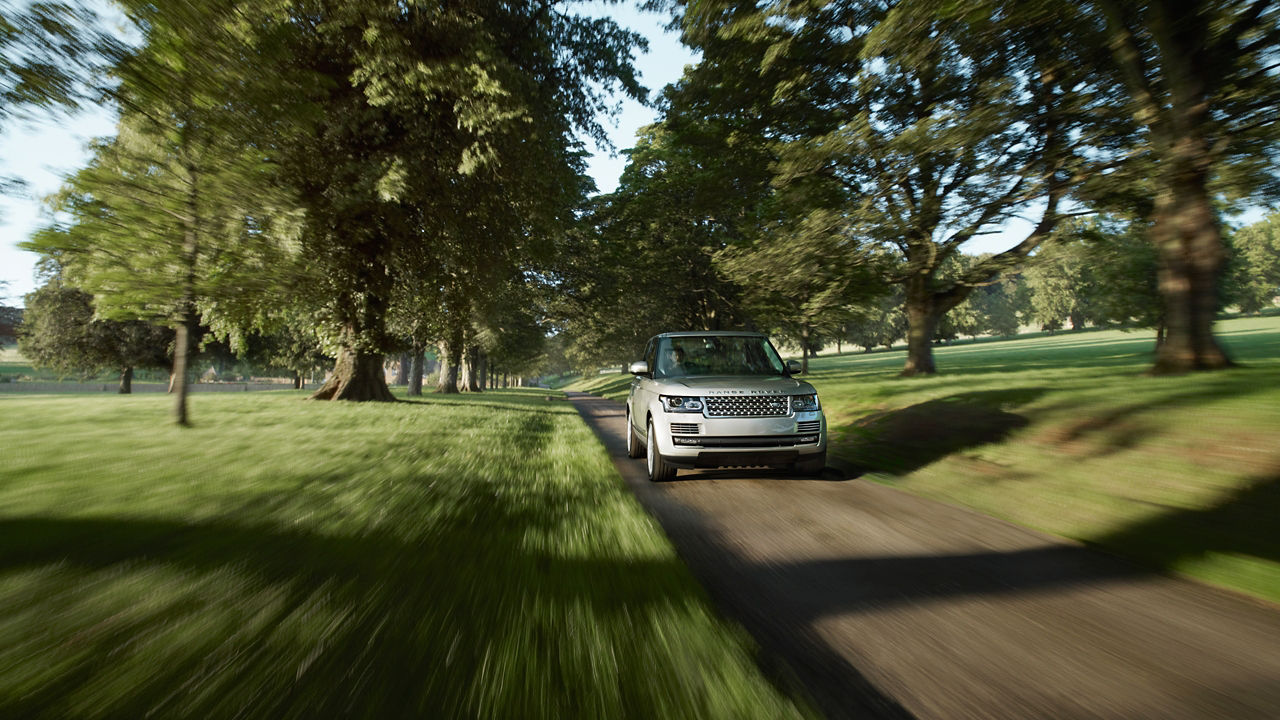 Range Rover drifting At High Speed on forest Road