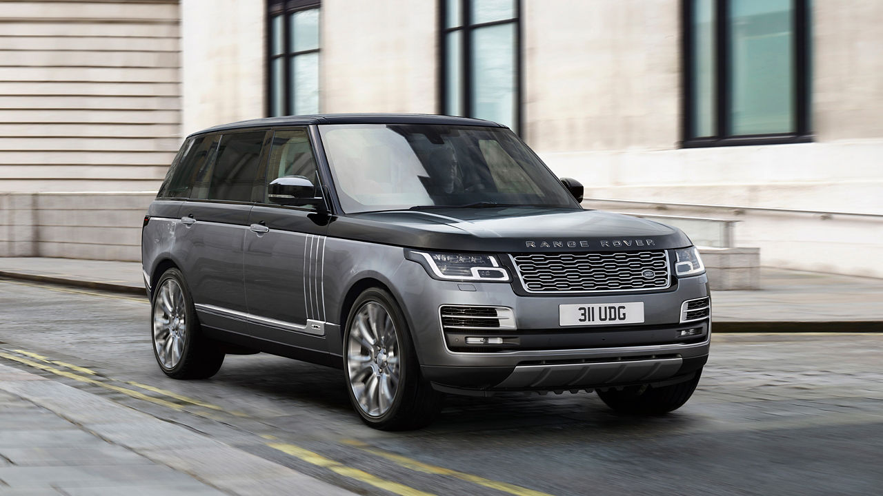 Parked Range Rover outside of building